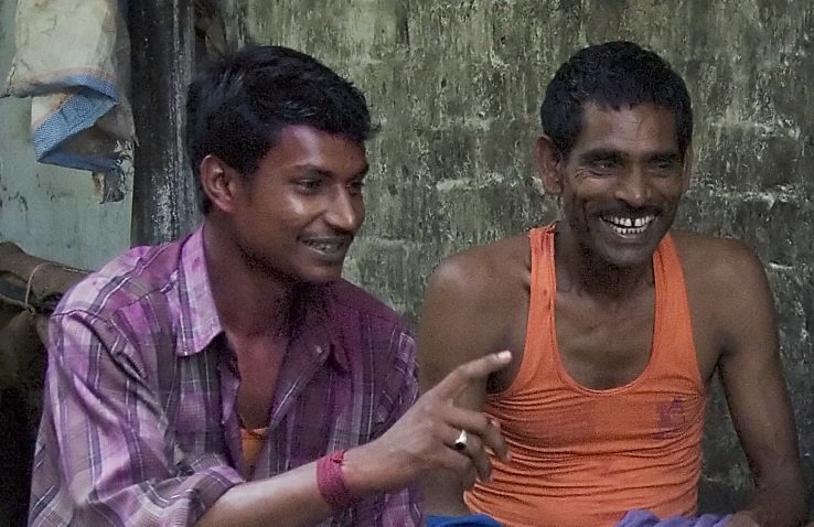 two indian men talking