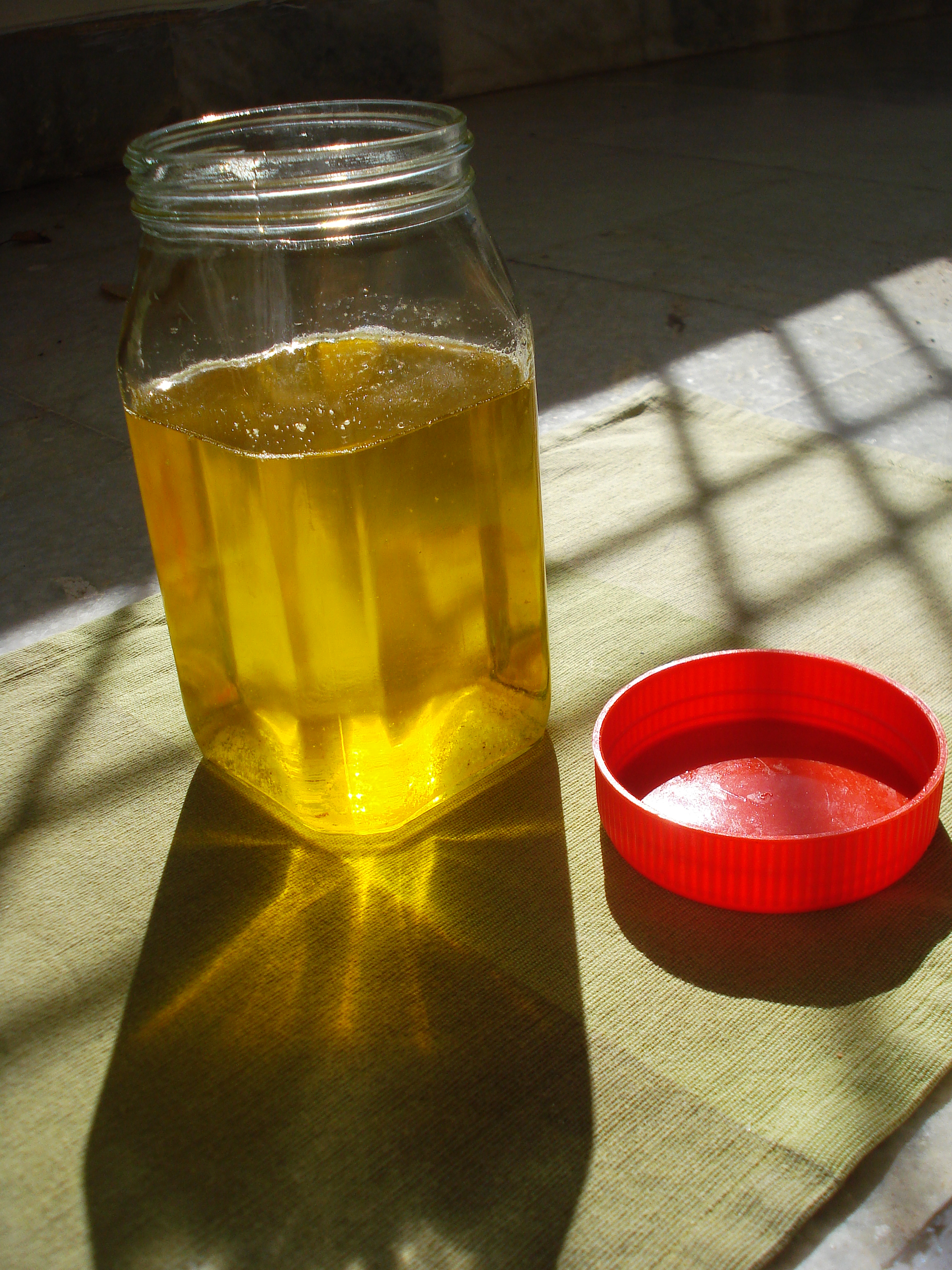 amber coloured juice in jar